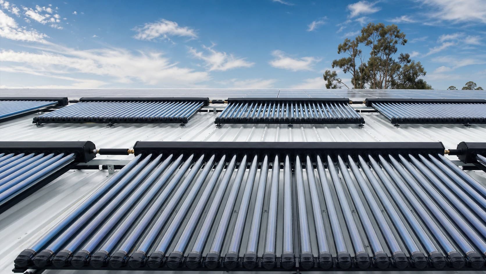 Commercial rooftop evacuated-tube solar thermal collector installation